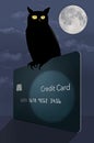 A wise old has selected a credit card upon which to rest in the moonlight