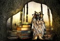 Beautiful wise owl near books in fantasy world Royalty Free Stock Photo