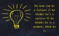 Black chalkboard with a bulb sketch and smart quote