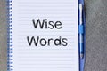 Wise words concept on notebook Royalty Free Stock Photo
