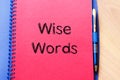 Wise words concept on notebook Royalty Free Stock Photo