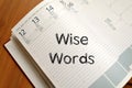 Wise words concept on notebook Royalty Free Stock Photo