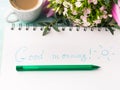 Wish good morning on notebook page and coffee Royalty Free Stock Photo