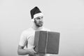 Wish list. Man handsome wear santa hat hold gift box. Hipster hold christmas gift. Give gift spread happiness