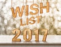 Wish list 2017 wood texture on marble table with sparkling bokeh wall,Holiday greeting card concept Royalty Free Stock Photo