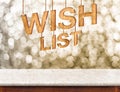 Wish list wood texture with sparkle star hang on marble table wi Royalty Free Stock Photo
