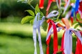 A wish tree. The ribbons of different colors are tied in the bra Royalty Free Stock Photo