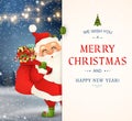 We Wish you a Merry Christmas. Happy new year. Santa Claus character with big signboard. Merry Santa Clause with jingle Royalty Free Stock Photo