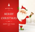 We Wish you a Merry Christmas. Happy new year. Santa Claus character with big signboard. Merry Santa Clause with jingle Royalty Free Stock Photo