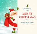 We Wish you a Merry Christmas. Happy new year. Santa Claus character with big signboard. Santa Clause with gift bag full of gift b Royalty Free Stock Photo