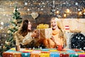 Wish you merry christmas. Present gift on winter holidays for close people. Best girl friends in christmas at home Royalty Free Stock Photo