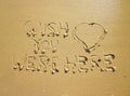 Wish you were here with a big heart above Royalty Free Stock Photo