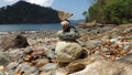 Wishing Stones pile up on the rocky beach Royalty Free Stock Photo