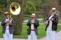 Wisley, Surrey, UK - April 30 2017: Trad Jazz trio in striped bo Royalty Free Stock Photo