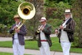 Wisley, Surrey, UK - April 30 2017: Trad Jazz trio in striped bo Royalty Free Stock Photo