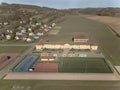 Wisniowa, Poland - 9 10 2018:Open school sports complex. Panorama of playing fields from a bird`s flight. Aerial photography from