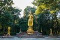 Wisnu or Narayana and Golden Buddha statue in Huay Tueng Thao reservoir park.