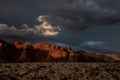 Wisp of Cloud Catches the Waning Sunlite Over Capitol Reef