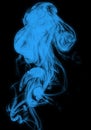 wispy blue smoke against a plain black background