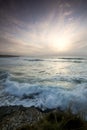 Wispy sky across sea