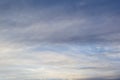 Wispy Translucent Clouds Against Darkening Blue Sky. Background Royalty Free Stock Photo