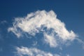 Wispy white clouds in blue sky