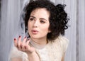 Wistful brunette model in lace blouse Royalty Free Stock Photo