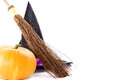 Witch broomstick, pumpkin and hat Royalty Free Stock Photo