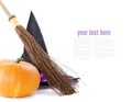 Witch broomstick, pumpkin and hat Royalty Free Stock Photo