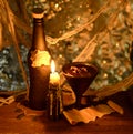 Witch drink with burning candle in the dark Royalty Free Stock Photo