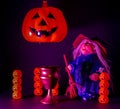 witch with hallowen pumpkins