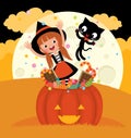 Witch and her cat celebrate Halloween Royalty Free Stock Photo