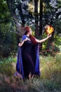 Witch holding a fireball Royalty Free Stock Photo