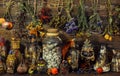 Witch laboratory with potion, elixirs, glass bottles, dry flowers, herbs and ingredients
