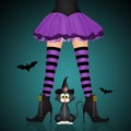 Witch legs and black cat for Halloween