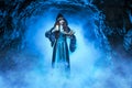 The witch with magic ball in her hands causes a spirits Royalty Free Stock Photo