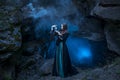 The witch with magic ball in her hands causes a spirits Royalty Free Stock Photo