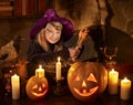 Witch with pumpkin lantern.