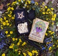 Witch runes, black candles and tarot cards