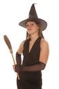 Witch stand with small broom