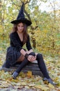 Witch on tomb stone Royalty Free Stock Photo