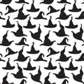 Vector seamless horror pattern for Helloween. Witch or wizard hats. Black silhouette on white background Royalty Free Stock Photo