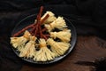 Witches Broom of smoked cheese suluguni and salami Royalty Free Stock Photo