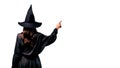 Witching Hour at Halloween, witch pointing at white copy space. Generative AI Royalty Free Stock Photo