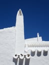 Withe chimney roof in Binibeca, Menorca, Spain Royalty Free Stock Photo