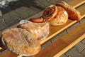 Withered bread and bagette outdoor on a bench