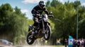 A motorcycle stunt rider doing tricks on a course created with Generative AI