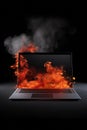 A burning laptop - smoke and fire - isolated black background - copy text space - professional studio surface