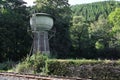 A witness of the time of Steam locomotives -an historic water tower on a railway