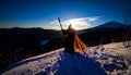 Wizard Casting Light Spell on Snowy Mountain Peak Royalty Free Stock Photo